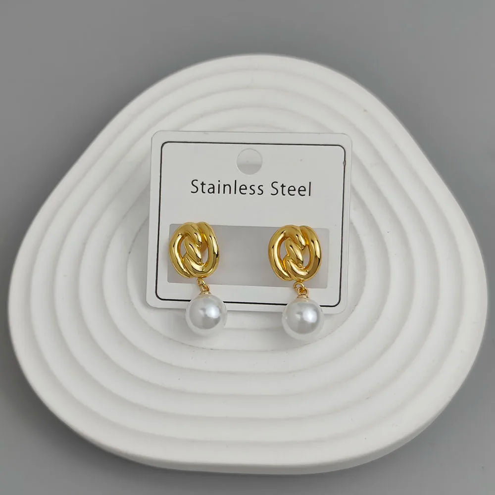 Creative heavy metal pearl shell stainless steel earrings, waterproof and rusty-free women's earrings, party jewelry