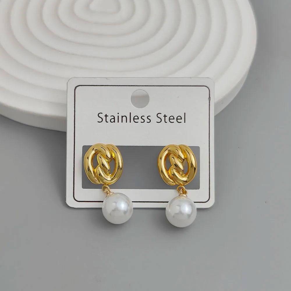 Creative heavy metal pearl shell stainless steel earrings, waterproof and rusty-free women's earrings, party jewelry