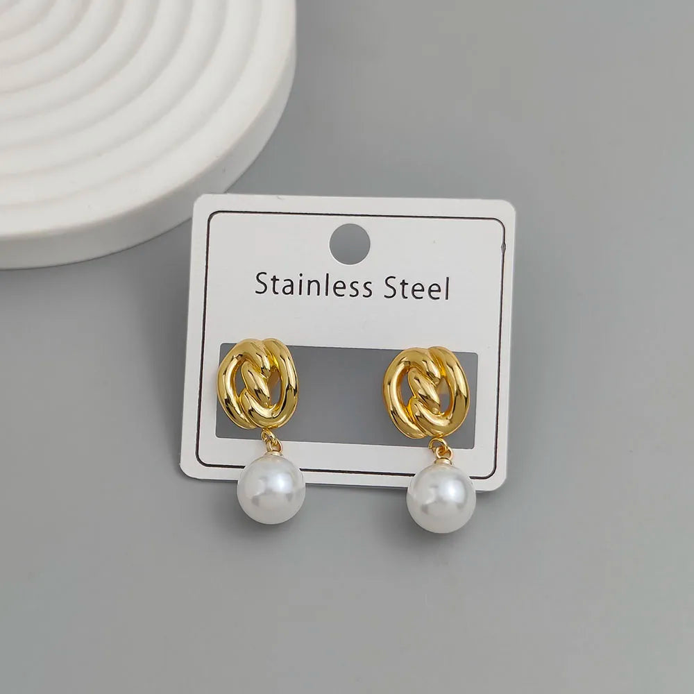 Creative heavy metal pearl shell stainless steel earrings, waterproof and rusty-free women's earrings, party jewelry
